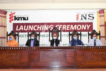 01.Minister of Health Taimur Salim Jhagra along with VC KMU Prof Dr Zia ul Haq and other sitting on stage during PhD Launching Ceremony1604146039.JPG